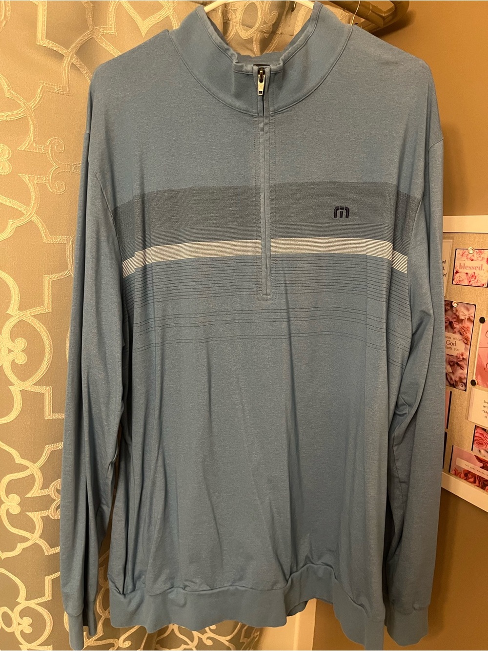 TravisMathew Light Blue Quarter-Zip Sweater with Subtle Stripe